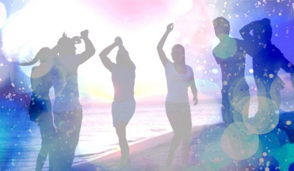 Dancing with friends on the beach to unwind